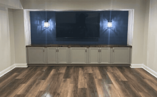 Custom built-in shelving and cabinetry fitted into an alcove